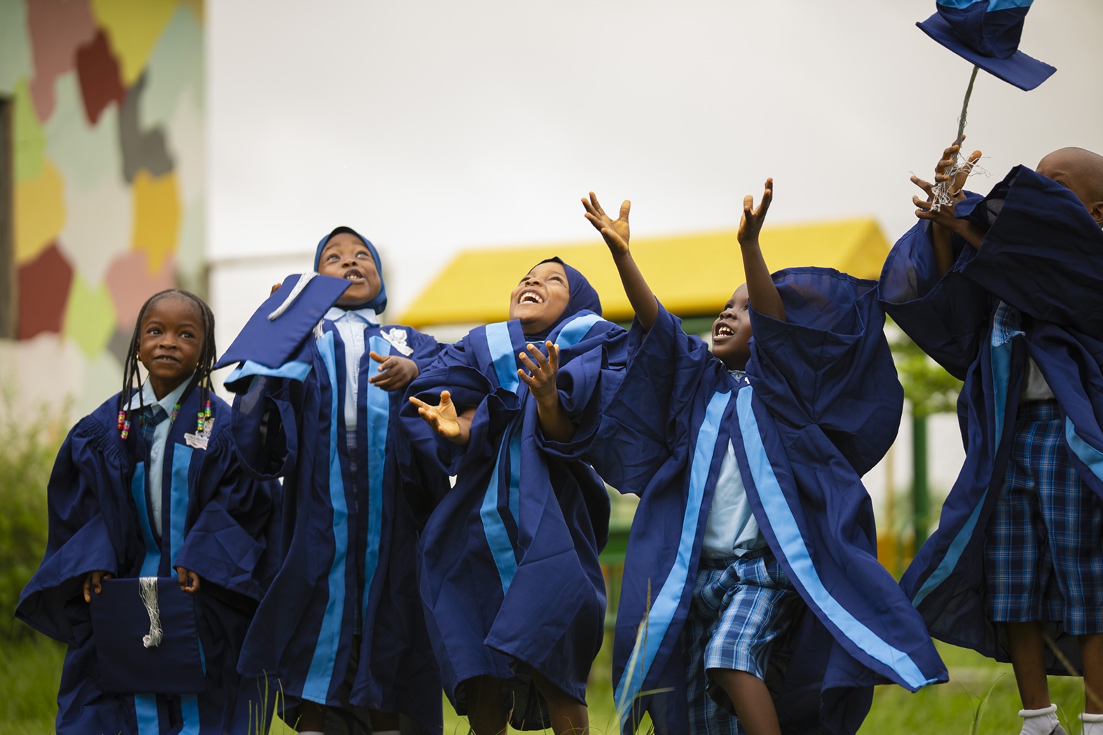 Noble Brains Academy graduates joyfully celebrating their achievement