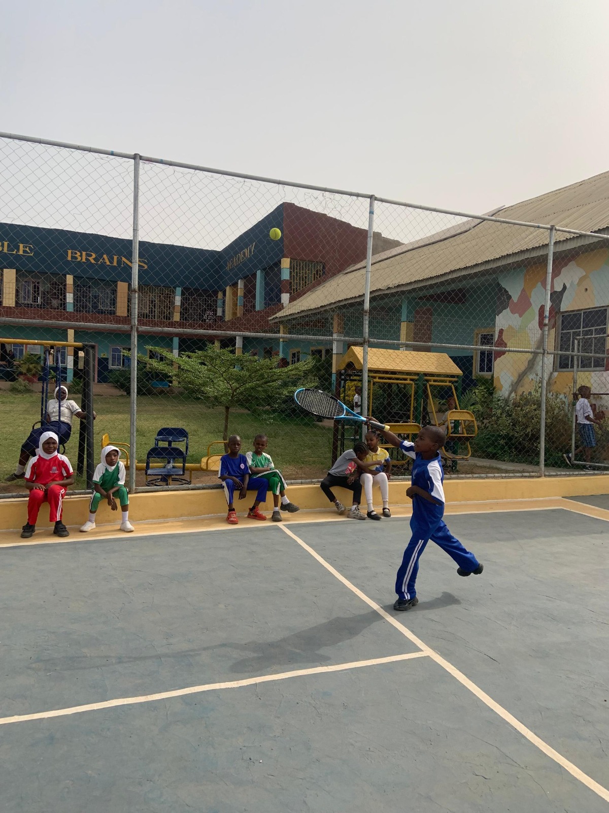 Noble Brains Academy tennis court and main academic complex